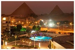Le Meridien Pyramids luxury hotel is beautifully set in its own landscaped gardens southwest of Cairo, Egypt and less than one mile from the Sphinx and the Giza Pyramids.