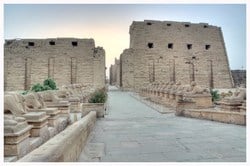 Karnak Temple is considered to be more than just a temple; it is an open museum and the largest ancient religious site in the whole world. It was built for the sacred Theban triad, God Amun Ra, his wife Goddess Mut, and their son, God Khnsu.