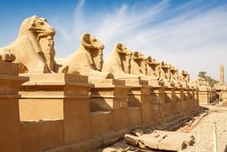 Karnak Temple is considered to be more than just a temple; it is an open museum and the largest ancient religious site in the whole world. It was built for the sacred Theban triad, God Amun Ra, his wife Goddess Mut, and their son, God Khnsu.