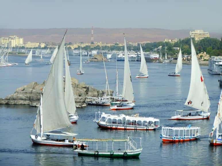 Felucca boats sailing on the Nile river, Aswan, Egypt