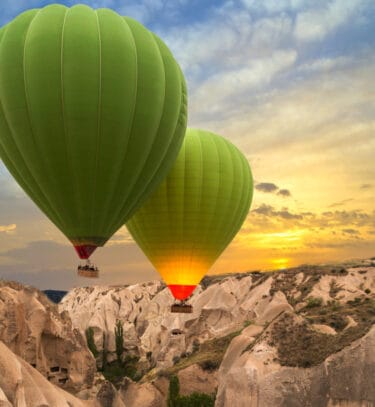 Hot air balloon flying sunset, Cappadocia, Turkey