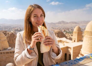 Tourist eating a Shawarma in Egypt